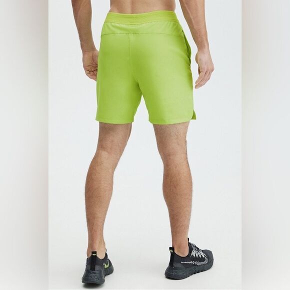 Fabletics Men’s Lime Green Fundamental 7” Athletic Shorts - Picture 2 of 9